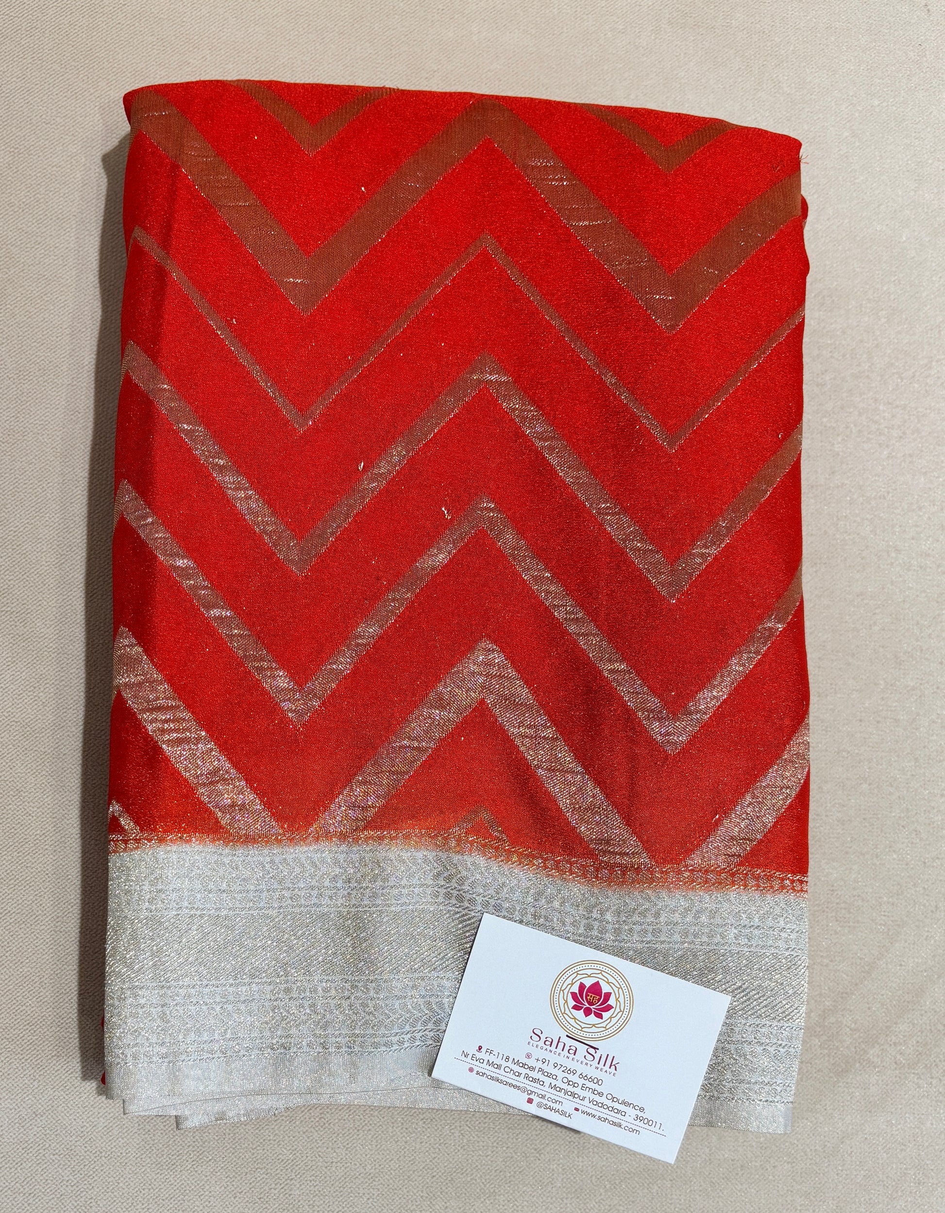 ORANGE COLOR ZIG ZAG PATTERN SEMI JORJET SAREE