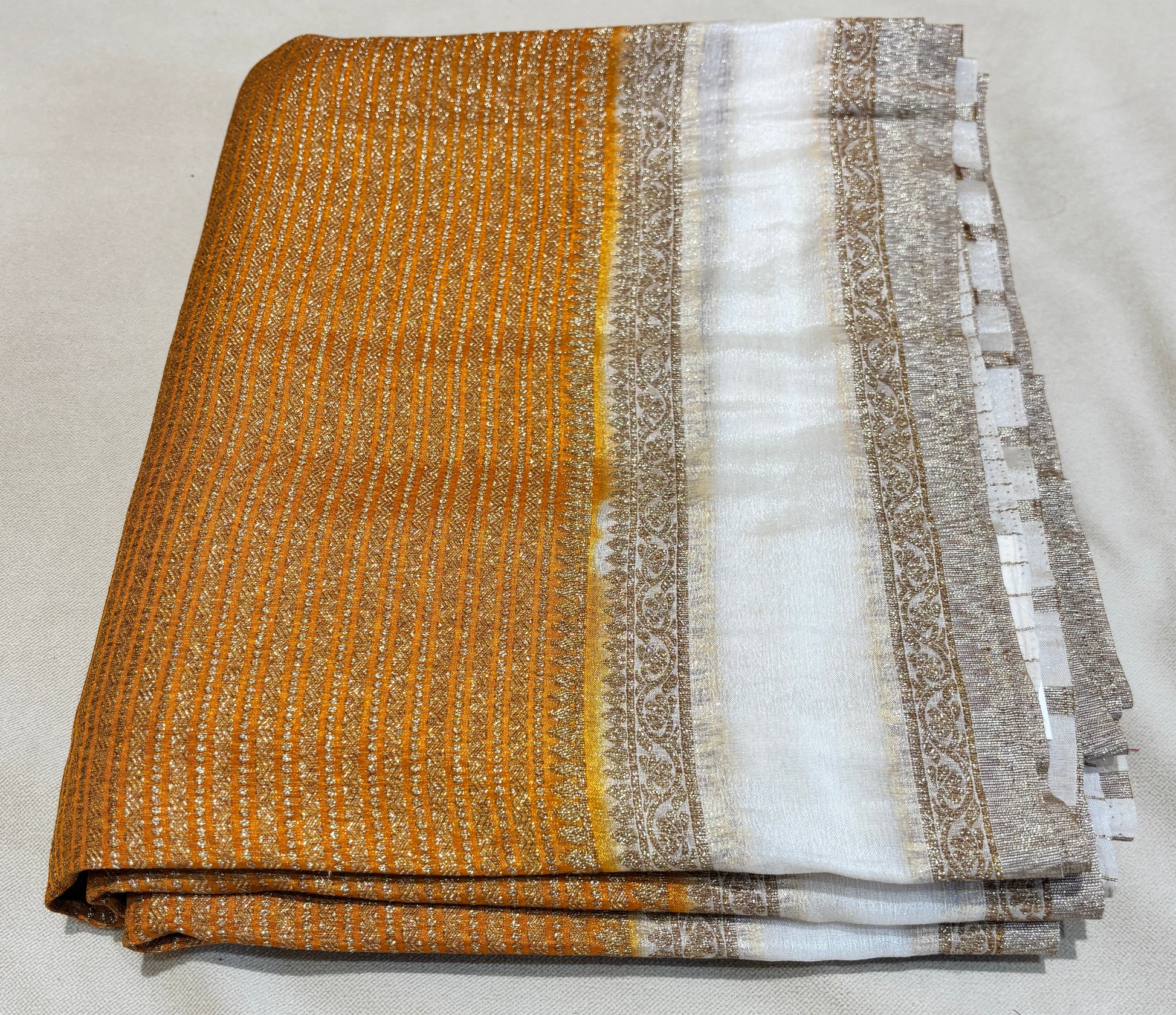 YELLOW COLOR KHADI JORJET WITH OFF-WHITE BENTEX BORDER